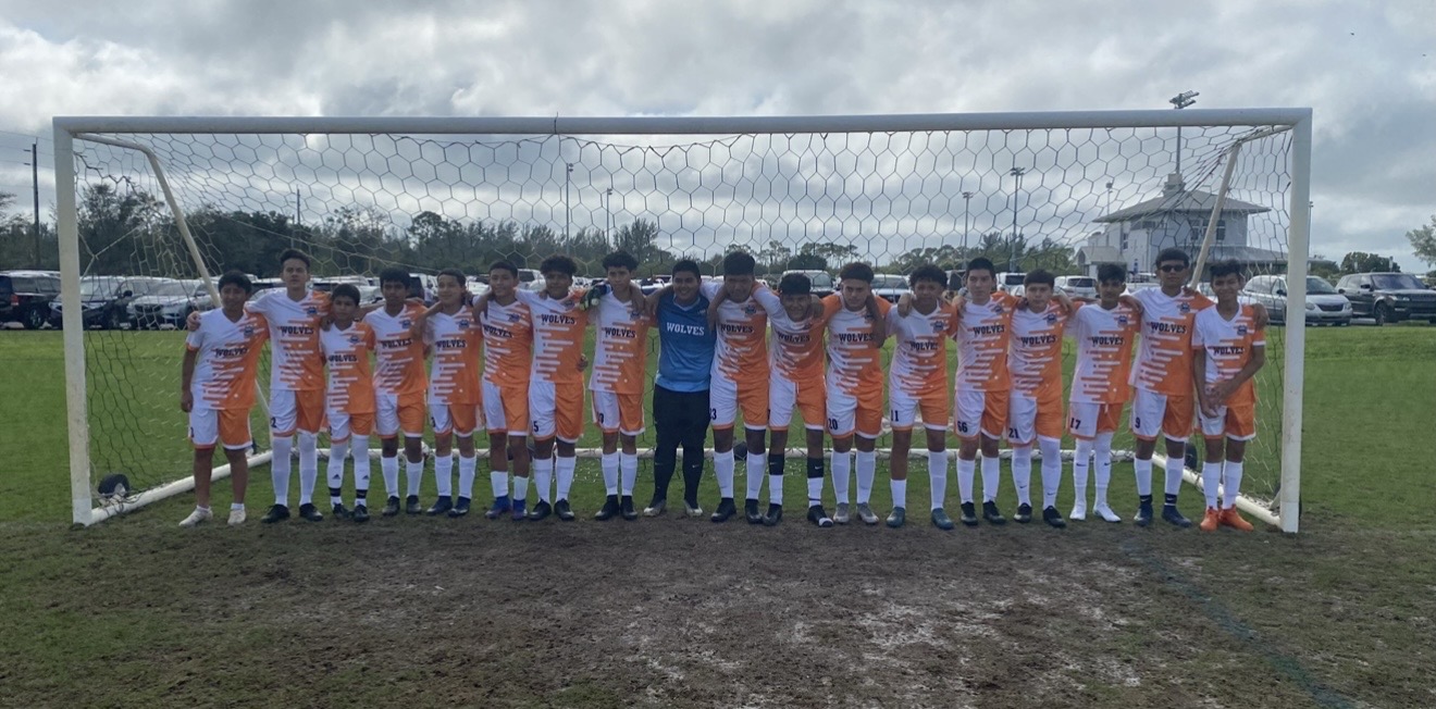 Wolves squad lined up across the goal mouth